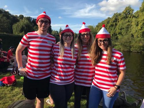 DY Team dressed up i Wheres Wally fancy dress by the riverside before the race